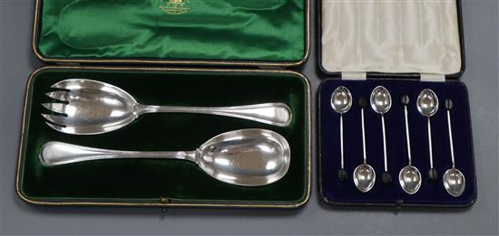 A cased pair of Old English thread pattern silver salad servers, London 1906 and cased set of six silver coffee spoons,